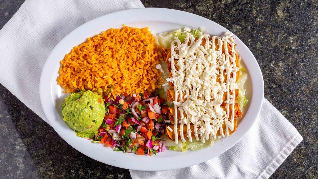 Flautas · Six crispy corn tortillas stuffed with chicken, beef or mixed. Served with sour cream, pico de gallo, guacamole and rice.