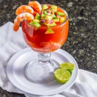 Coctel De Camarones · Shrimp cocktail prepared with special sauce, onions, tomatoes, cilantro, and avocado, served...