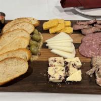 Cheese Platter · Chef's choice of cheeses with house made relishes and olives
Add Charcuterie: Chef's choice ...