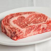Prime 32 Day Dry Aged 14Oz Ribeye · Choice of two sides