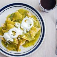 Chilaquiles · Cut stir-fried corn tortillas simmered in green or ranchero sauce topped with queso fresco, ...