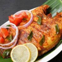 Camarones Al Gusto · A whole fried tilapia, then simmered in your choice of sauce.