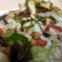 Chimi Chicken Bowl · White rice, black beans, grilled marinated chicken, lettuce, tomato, chimichurri dressing