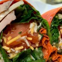 Turkey Club Wrap · Turkey, bacon, ham, Swiss cheese, lettuce, tomato, and honey mustard in a roasted red pepper...