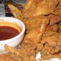 Fried Chicken Wings · Made fresh to order,  our wings are seasoned, battered and fried to golden crunchy perfectio...