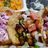 Seafood Taco Special · 3 tacos, your choice of four signature fish or shrimp tacos, rice, beans, and drink.