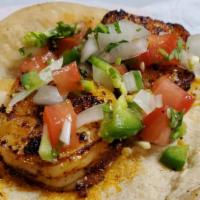 Blackened Guajillo Shrimp Taco · Signature sautéed guajillo chili marinated shrimp with house pico de gallo