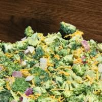 Broccoli Salad · Broccoli, ranch, sunflower seeds, onion, salt and pepper, cheddar cheese.