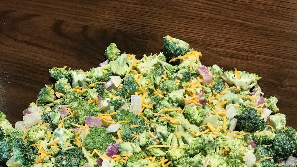 Broccoli Salad · Broccoli, ranch, sunflower seeds, onion, salt and pepper, cheddar cheese.