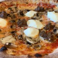 Pizza Roberta  · Mozzarella, Ricotta Cheese, Homemade Sausage, Mushroom, San
Marzano Tomato Sauce.