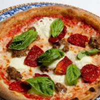 Pizza Melize  · Mozzarella, Ricotta, Homemade Sausage, Sun Dried Tomatoes, Fresh
Basil, San Marzano Tomato S...