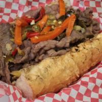 Italian Beef · Served Dipped or Dry
Hot or Sweet peppers