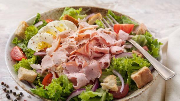 Chef’S Salad · Hard-boiled egg, onion, tomato, green pepper and cucumber over a crisp salad with choice of dressing,