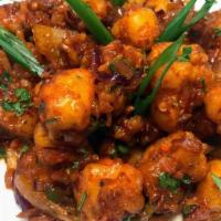 +Gobi Manchurian · ...stir fried cauliflower with onion, peppers, scallions in manchurian sauce. (vegan, contai...