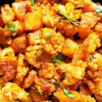 +Aloo Gobi · ...potatoes and cauliflower cooked with onions tomatoes and spices. (vegan, contains no meat...