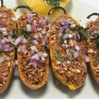 +Cut Mirchi · ...batter fried jalapeno peppers stuffed with ground peanuts and chopped onions. served with...