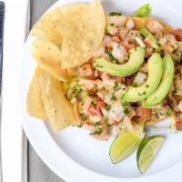 Ceviche · Fresh tilapia cooked in lime juice and spices. Served with tomatoes, onions, jalapenos and c...