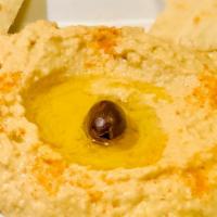Hummus · Freshly House Made Hummus Served with Warm Greek Pita