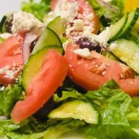 Greek Salad · Lettuce, cucumber, tomatoes, onion, kalamata olives, feta cheese and Greek vinaigrette dress...