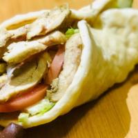 Spicy Chicken Gyro · Spicy Chicken Gyro, Romaine lettuce, Red Onion, Tomato, Cucumber and Tzatziki Sauce Wrapped ...