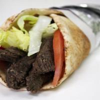 Beef Gyro · Beef Gyro , Red Onion, Tomatoes, Cucumber and  Tzatziki Sauce Wrapped in Fresh Greek Pita.