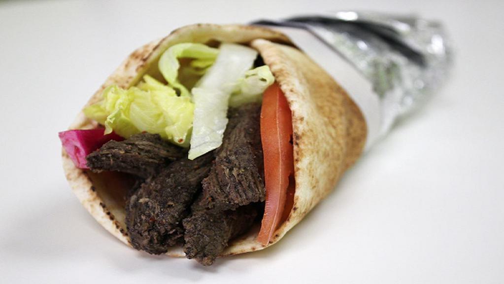 Spicy Beef Gyro · Spicy Beef Gyro , Red Onion, Tomatoes, Cucumber and  Tzatziki Sauce Wrapped in Fresh Greek Pita.