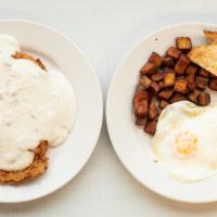 Indianapolis - Country Fried Breakfast · Fried tenderloin covered with sausage gravy. Includes two eggs, home fries and a side of toa...