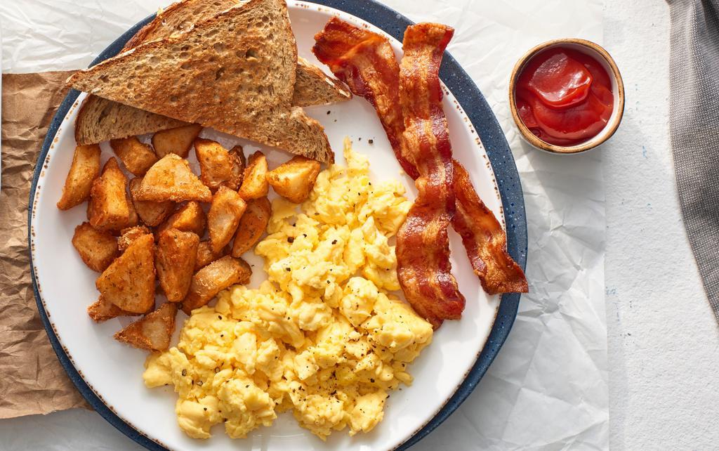 Eggs Your Way · 560-810 Cal. Choice of applewood-smoked bacon, chicken or pork sausage, with breakfast potatoes, choice of artisan or multigrain toast.