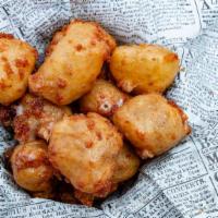 Cheese Curds · Home tempura battered cheddar curds.