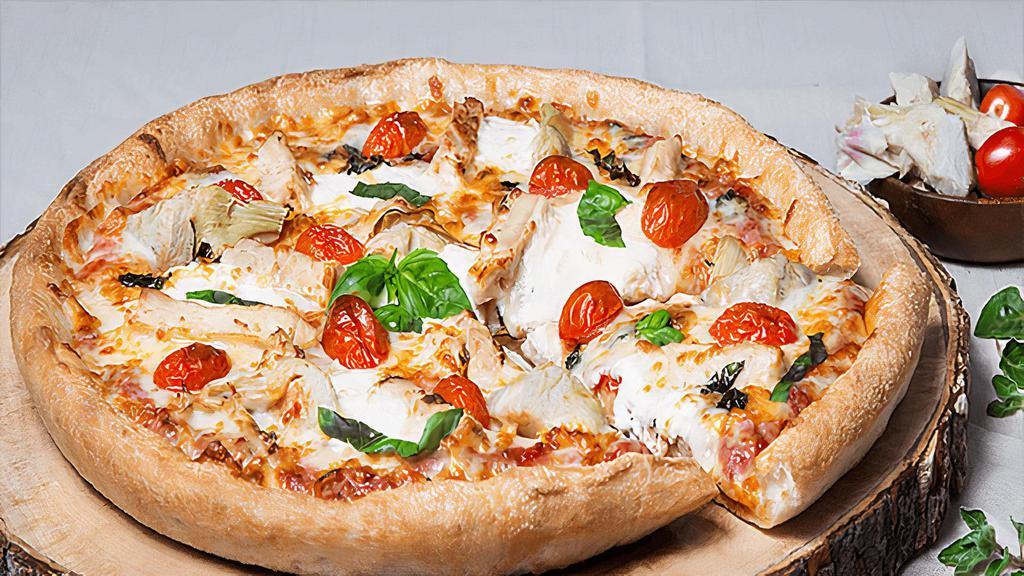 Chicken Supreme Pizza · Artichoke hearts, chicken breast, ricotta and mozzarella cheeses, roasted garlic, fresh tomatoes and basil.