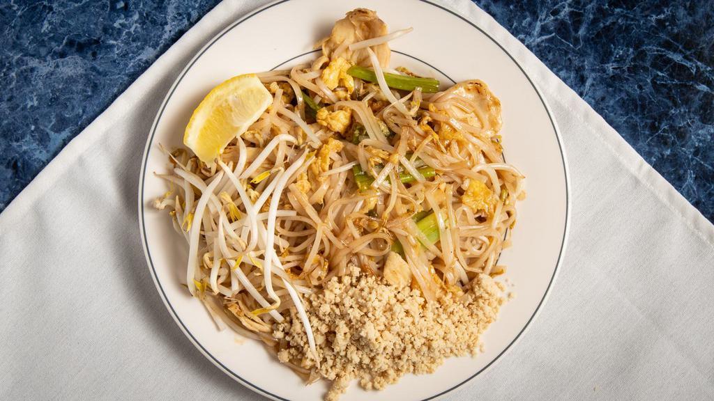 Pad Thai · Gluten-free. Sautéed rice noodles with eggs, beansprouts and green onions, topped with crushed peanuts.