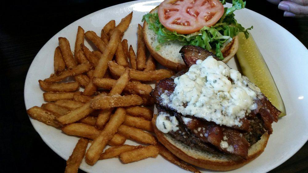 Bleu Cheese & Bacon Burger · Half pound. Burger with tasty bleu cheese and crispy applewood smoked bacon on our toasted bun.