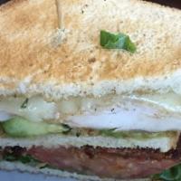Chicken Avocado Club · Grilled chicken breast with avocado, bacon, tomatoes, swiss cheese, and herb mayonnaise, ser...