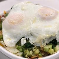 Veggie Skillet · Spinach, mushrooms, broccoli, onions, green peppers, topped with American and mozzarella che...