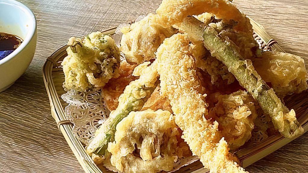 Tempura Sampler · 2 sweet potato, 2 shrimp, asparagus, broccoli, and shiitake with house made tempura dipping sauce.