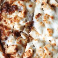 Bbq Chicken Flatbread · Chicken, bacon, red onion, Mozzarella cheese, and savory's bbq ranch dressing.