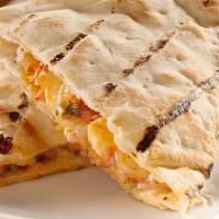 Kid'S Chicken Quesadilla · roasted chicken and a blend of cheeses on a tortilla