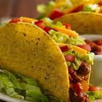 Tacos (3 Pieces) · Corn or flour soft- or hard shell tortillas with choice of protein, beans or veggies, and to...