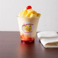 Pina Colada Max · Pina colada smoothie, top with diced pineapple and cherry on top.