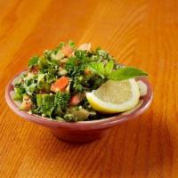 Small Tabulee · Parsley, tomatoes, scallions & cracked wheat tossed with extra virgin olive oil & herb dress...