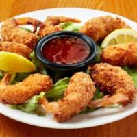 Mediterranean Coconut Shrimp · Hand-dipped in our signature batter, then tossed in coconut and fried golden brown, served w...
