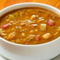 Moroccan Harira · Moroccan signature soup. Hearty lamb soup with green lentils, chickpeas, fava beans, shallot...