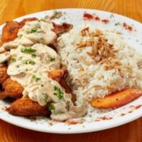 Chicken Cream Chops · Tender chicken, seasoned and breaded, pan-fried to a golden brown, served with our signature...