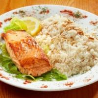 Grilled Salmon · Charbroiled Norwegian Atlantic salmon fillet marinated in olive oil and spices.