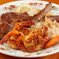 Palm Palace Combo · Two pieces of lamb chops and one skewer of jumbo shrimp (Contains peanut).