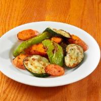 Side Grilled Vegetables · Grilled marinated seasonal vegetables.