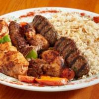 Shish Combo For Two · One shish kabob, two shish tawook and two shish kafta served with your choice of two house s...
