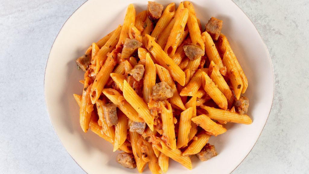 Penne Alla Vodka With Sliced Sausage · Our flagship dish! Delicious Barilla Penne in Vodka sauce, roasted mild Italian sausage topped with grated parmesan cheese.