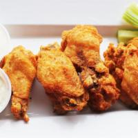 Wings · Gluten-free. Bone-in wings. Served with buttermilk ranch or bleu cheese dressing and celery ...