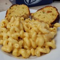 Mac & Cheese* · Rich and delicious. Creamy three-cheese mac sauce and cavatappi noodles. Served with garlic ...